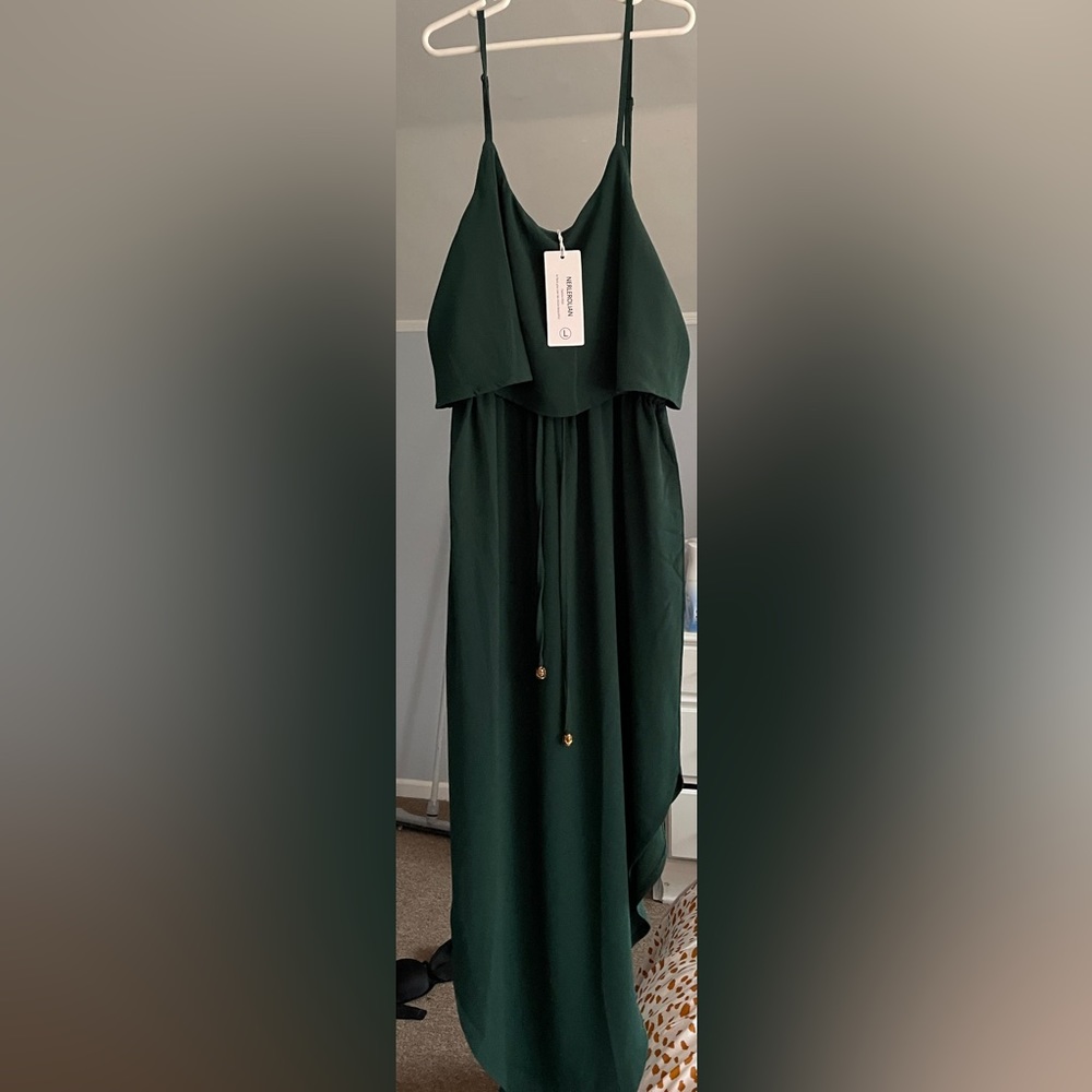 Dark green boutique dress with bead detailing on front